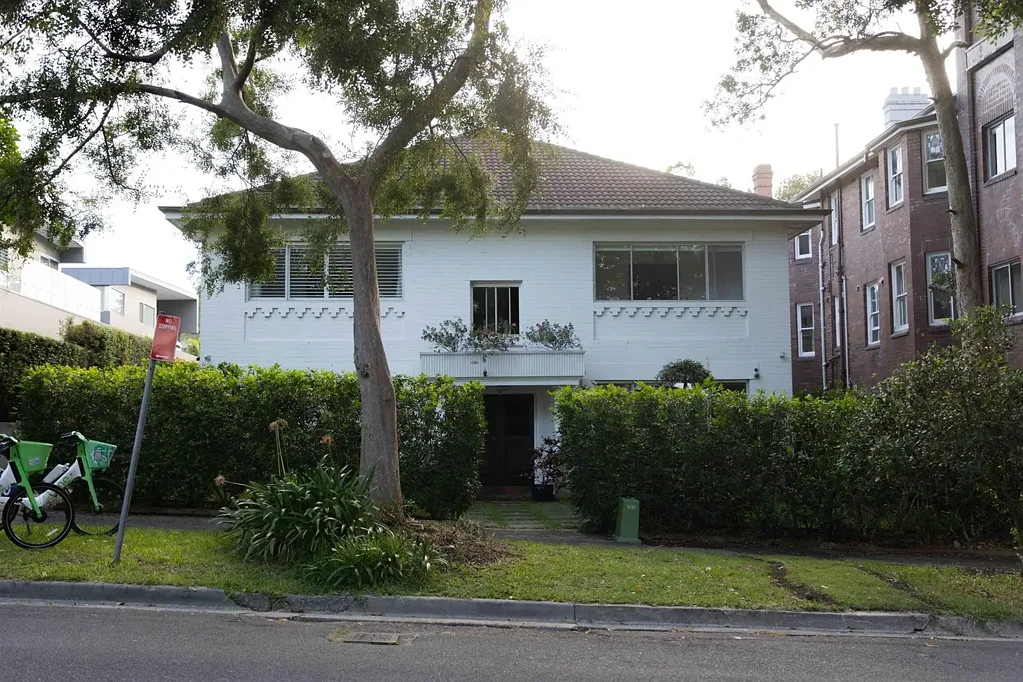 Spacious Two-Bedroom Apartment with Sunroom & Lock-Up Garage