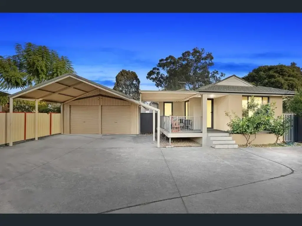 Spacious Three-Bedroom Brick Home with Workshop, Garage & Main Road Exposure