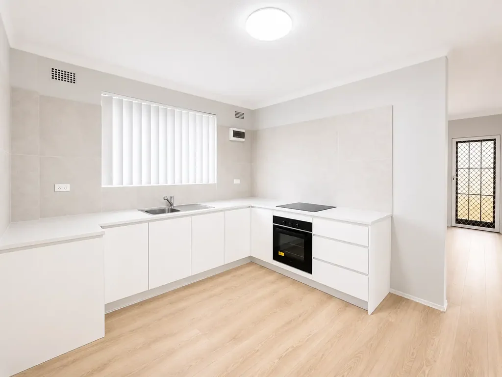 Stylishly Renovated 2-Bedroom Apartment with Balcony