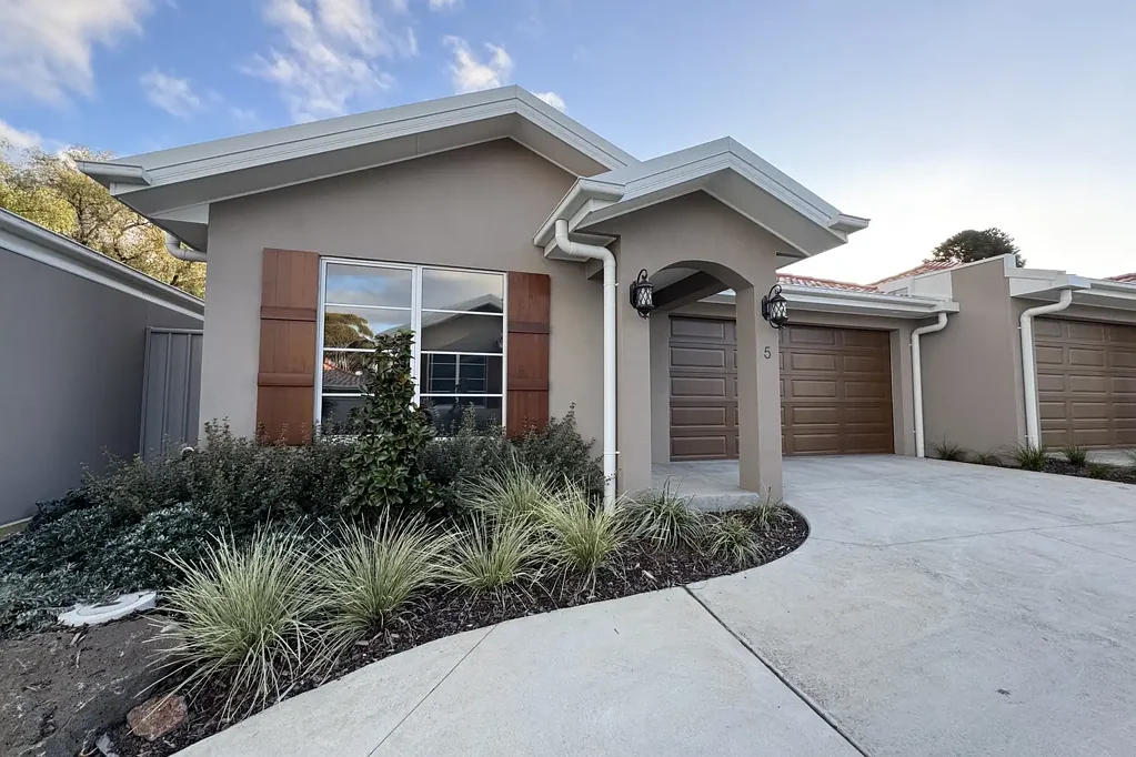 Brand New, Low-Maintenance Living in a Convenient Location