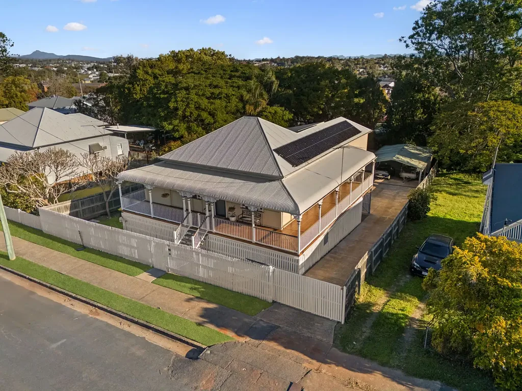 Renovated Queenslander with Poolside Living and Modern Comforts
