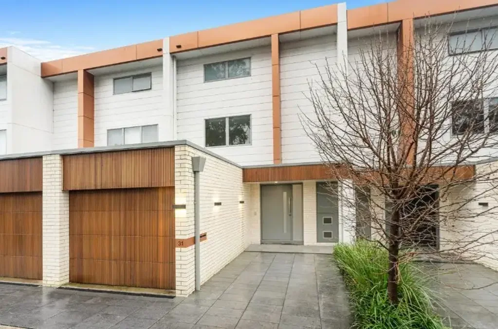 Beautiful tri-level terrace offers a stylish modern lifestyle