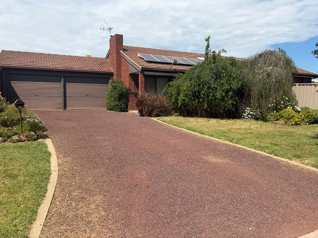 Charming Home with Beautiful Gardens & Excellent Storage