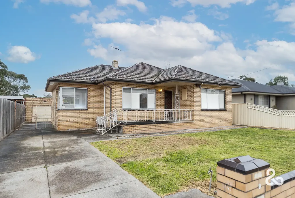 Well-Maintained Three-Bedroom Home with Large Backyard