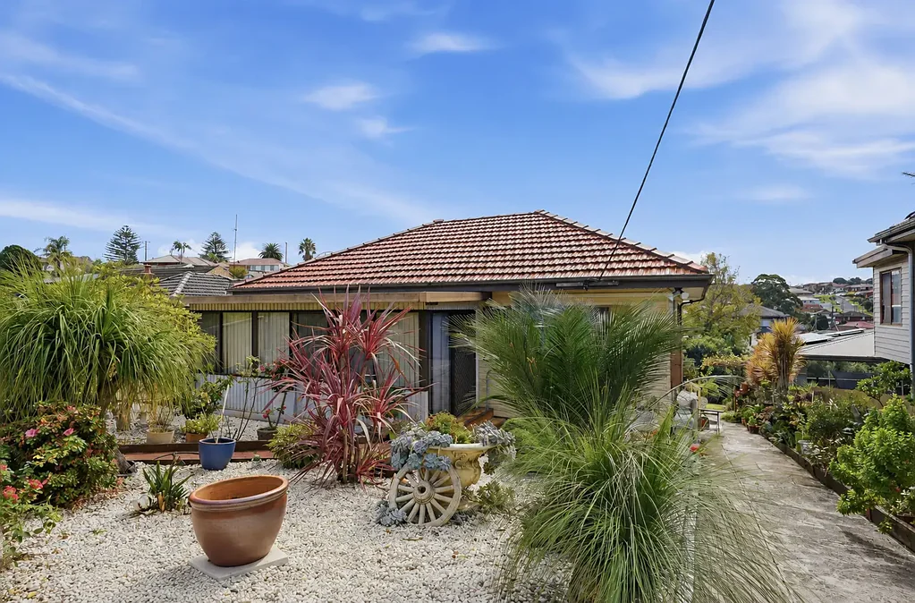 Beautifully Refreshed Family Home with Established Gardens!
