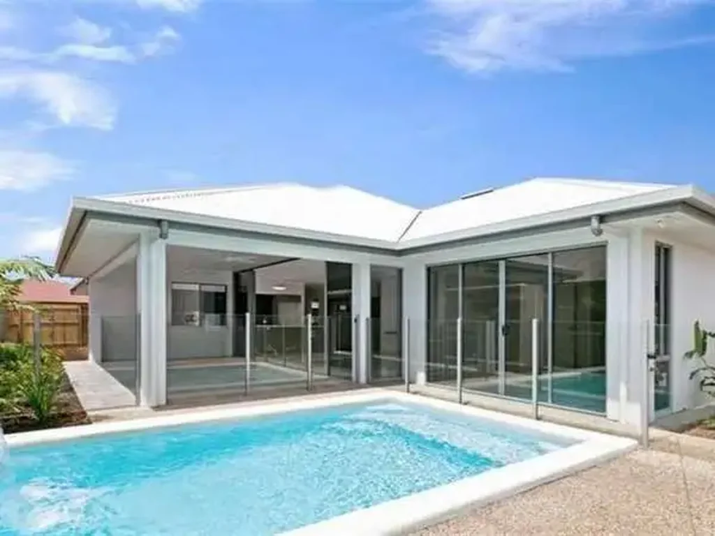 TROPICAL LIVING WITH POOLSIDE APPEAL
