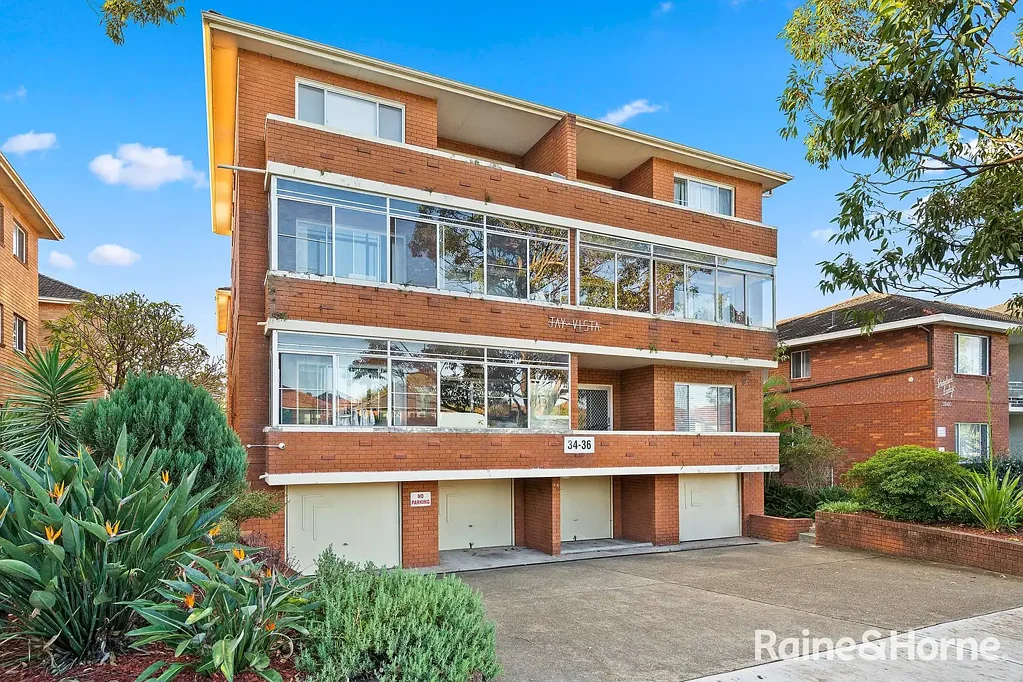 Kogarah 2房 Kogarah市中心步行 31.6平米车库 明亮朝向 宽敞阳台 东向晨光 现代厨房 滑动门通阳台 Central Lifestyle in a Full Brick Block