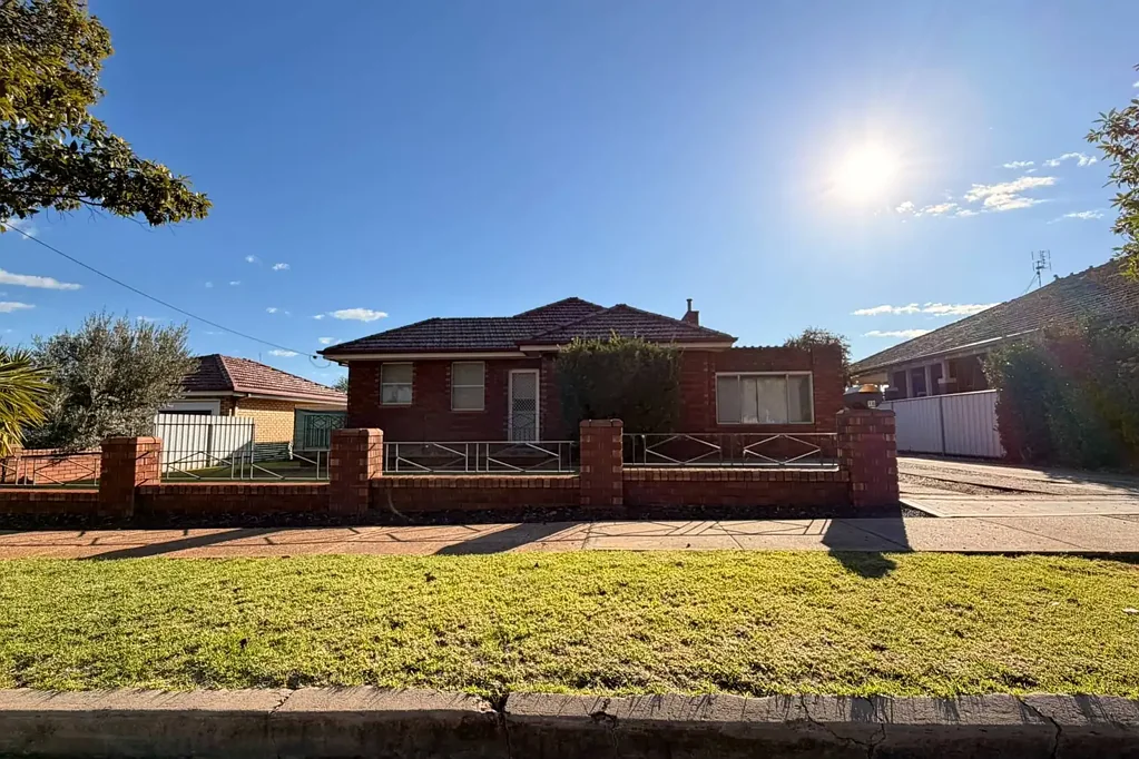 3-Bedroom Brick Home with Large Garage & Workshop