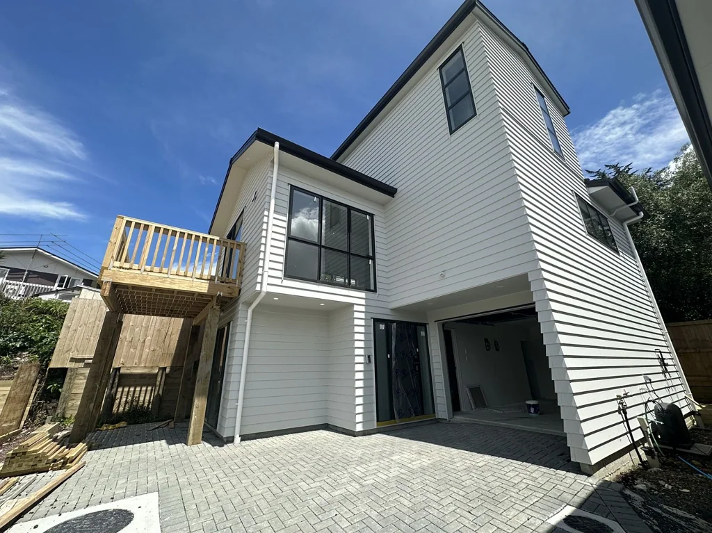 This brand-new house offers four bedrooms, 3 bathrooms, and a single garage.