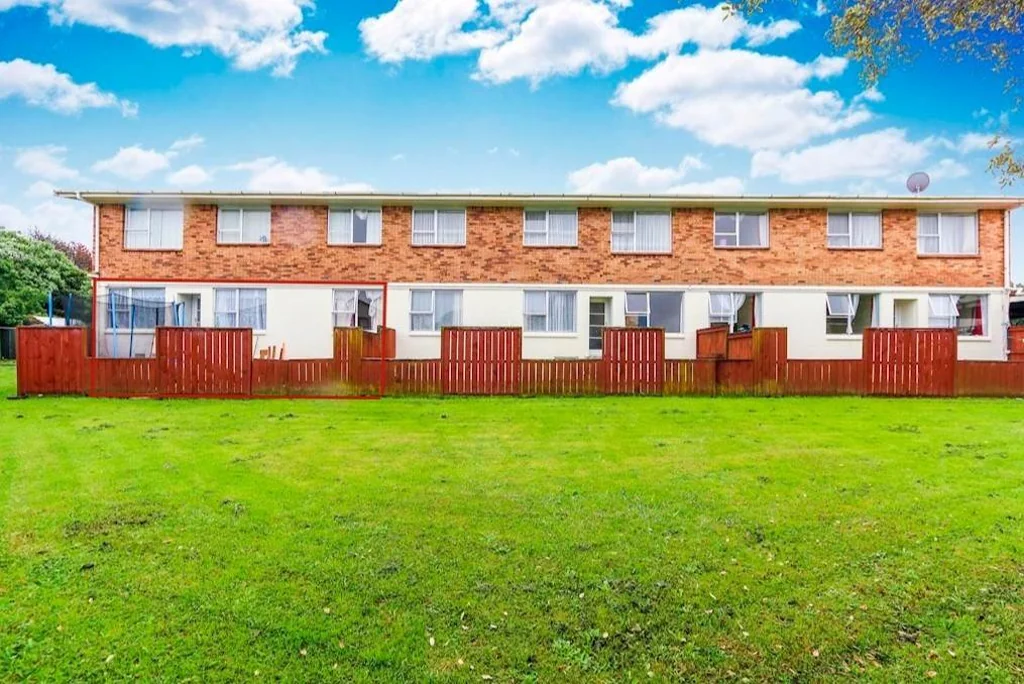 Solid two bedroom unit, in family style block.