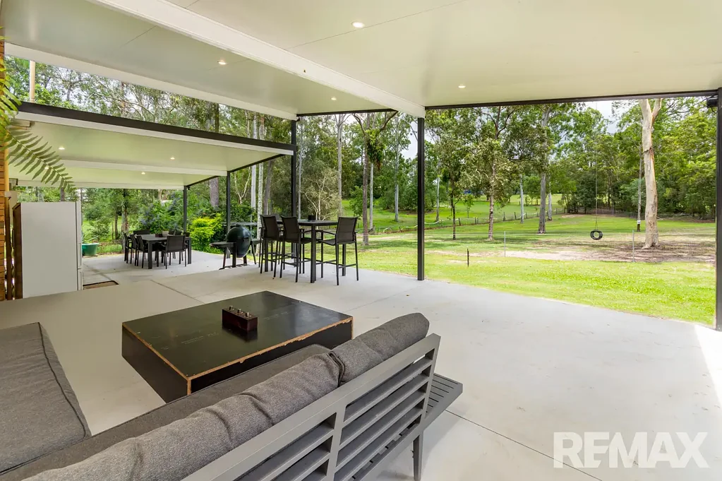 Peaceful Acreage Living With 4 Bay Shed!