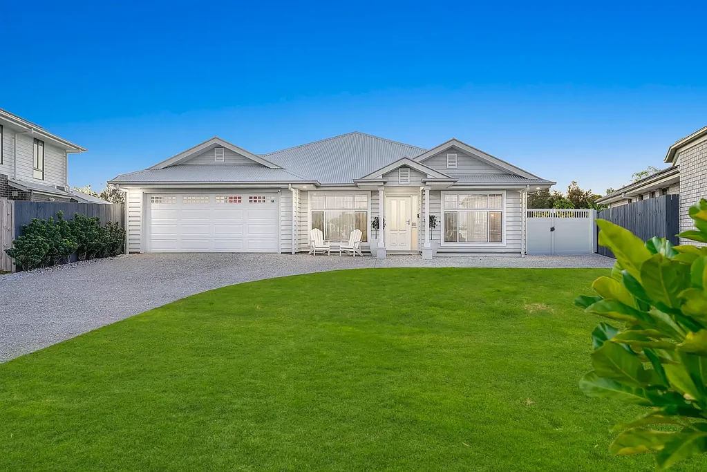 Mango Hill 4 Bedroom Custom built McCarthy Residence on the largest lakefront block within Capestone!
