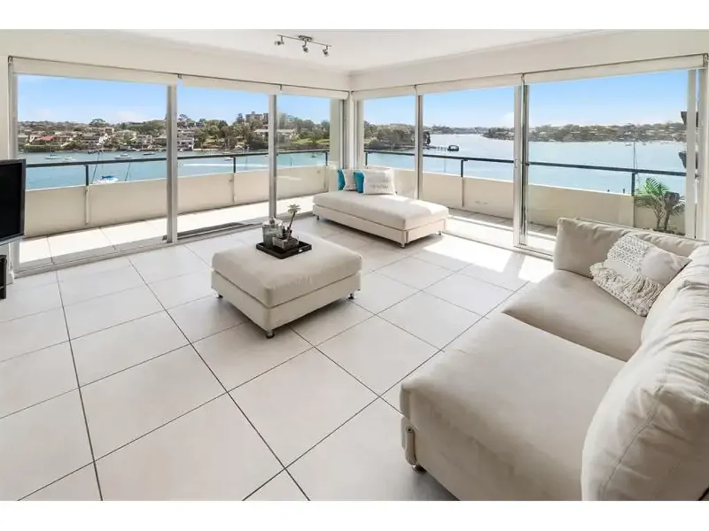 Resort-Style Penthouse Living with Panoramic Water Views