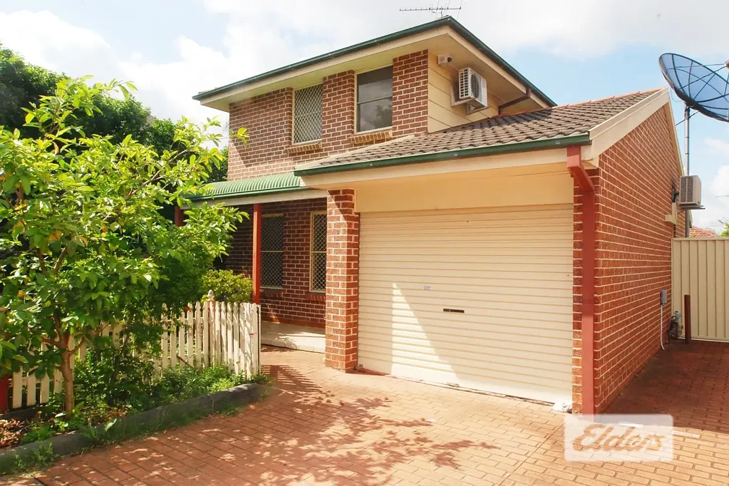 Spacious Two-Bedroom Townhouse Plus Study with Private Courtyard