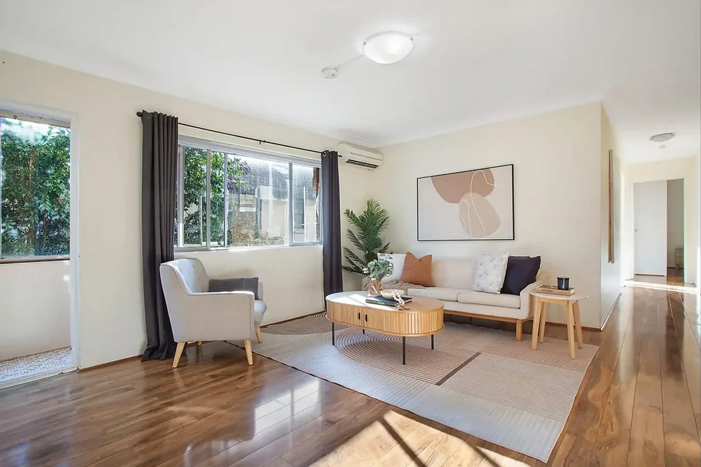 Tranquil sun-drenched apartment with two lock-up garages