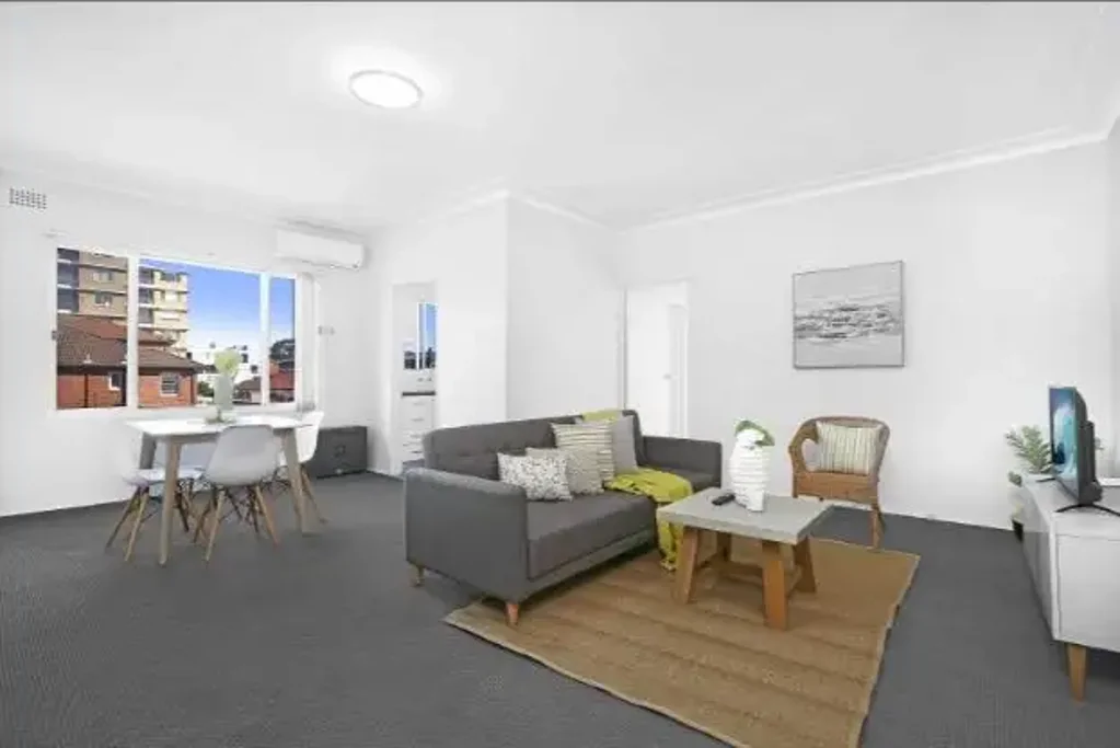 Seaside Living with Rare Rear Lane Garage & Parking!