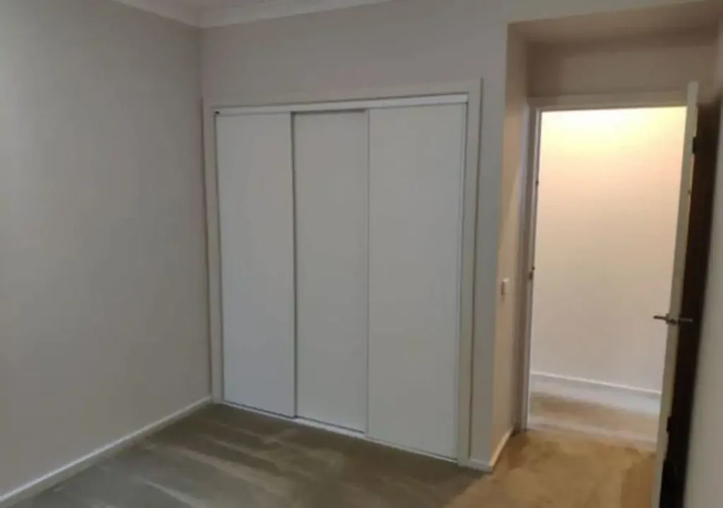 Modern Three-Bedroom Townhouse with Stylish Living in Prime North Melbourne Location