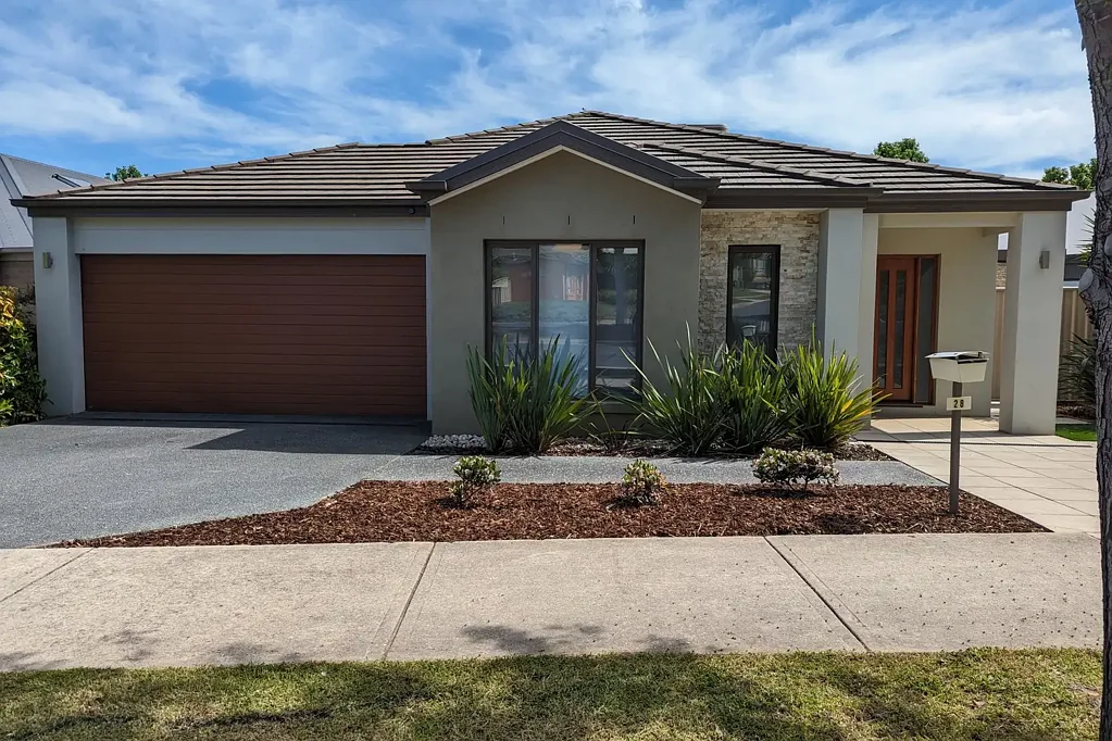 Low Maintenance, Conveniently Located Home