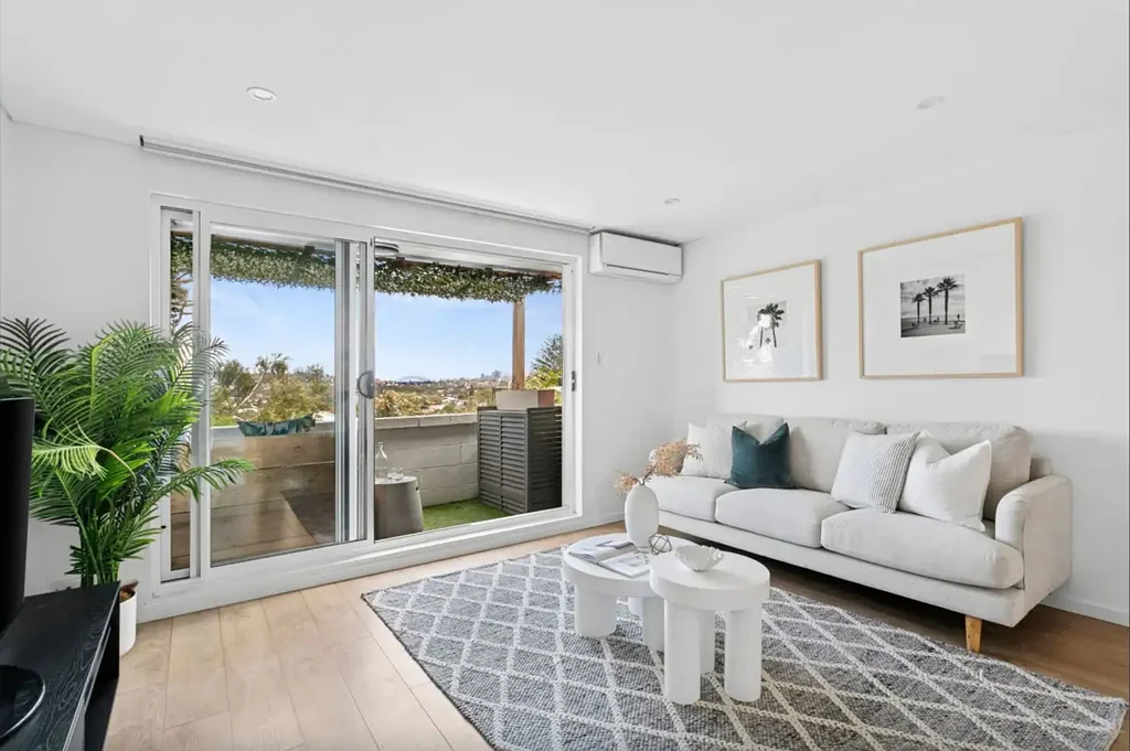 Modern Top-Floor Coastal Retreat with Views in Prime North Bondi Location