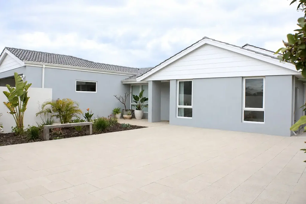 FULLY RENOVATED FEATURE HOME WITH SIDE & DRIVE-THROUGH ACCESS TO WORKSHOP — JUST METRES FROM THE WATER'S EDGE