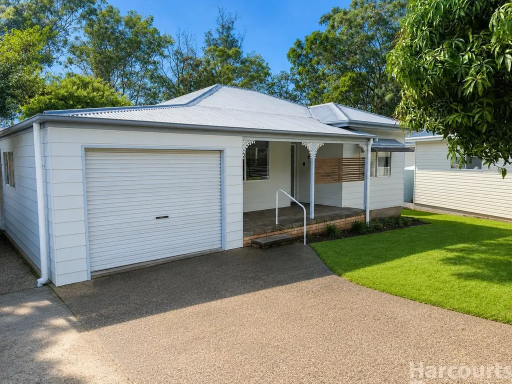 Enjoy the Best of Both Worlds: Waterfront Serenity & Town Convenience