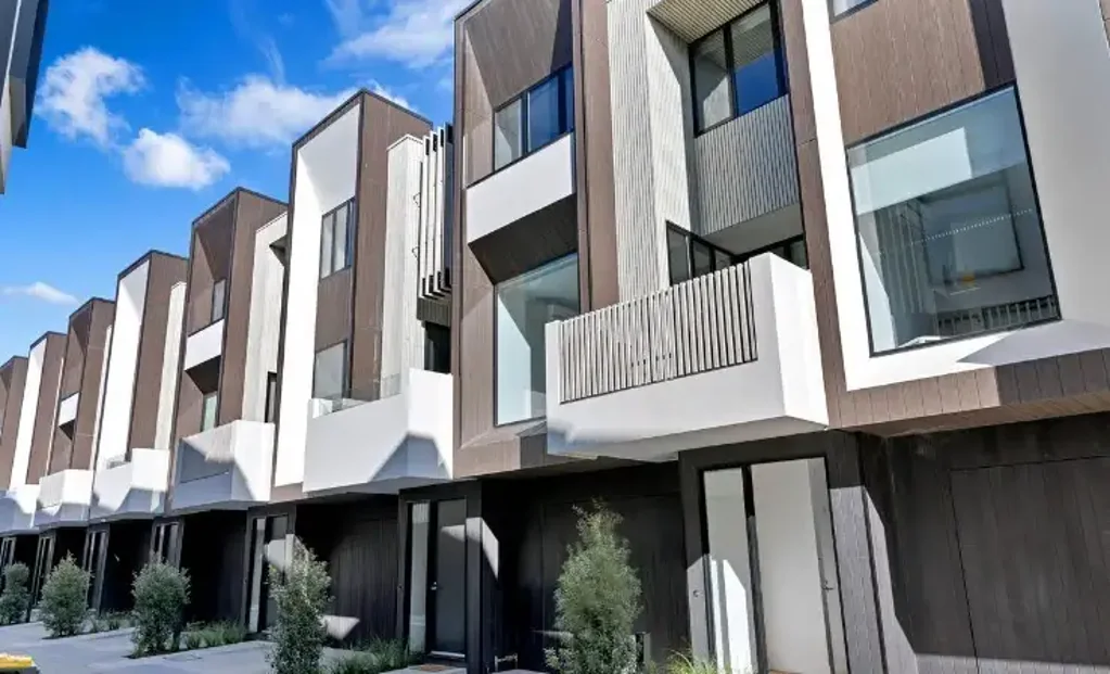 Luxury Coastal Living in a Designer Tri-Level Townhouse