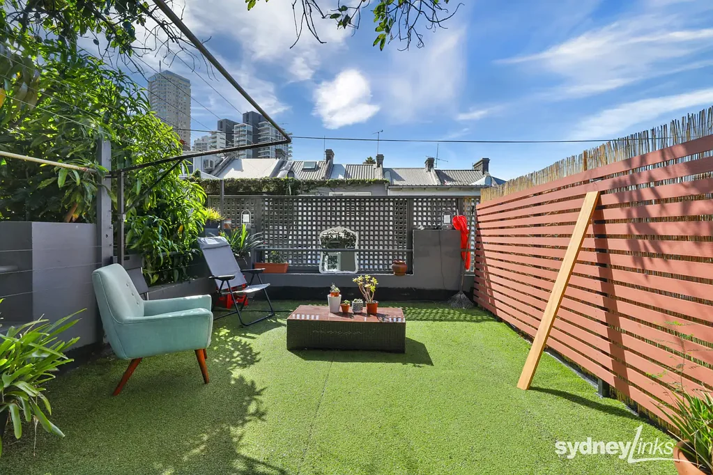 Laneway Top Floor Residence with Top Floor Deck Unfurnished - under Avocado Tree - include electricity and water