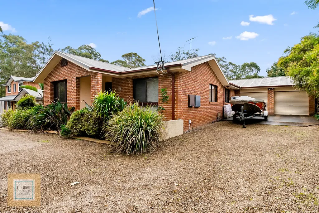 Family home with Rural Aspect + 4 Car Accommodation on approx. 1/2 an Acre!