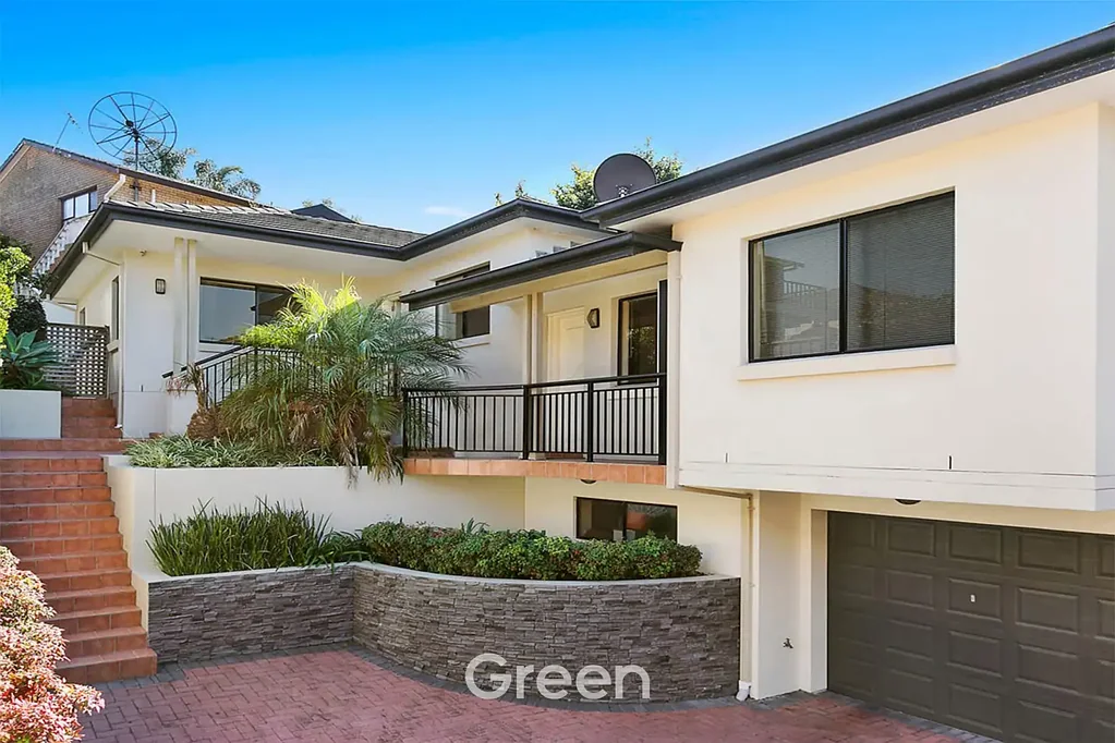Well-Appointed Three-Bedroom Townhouse with Tandem Garage and Workshop/Storage Area