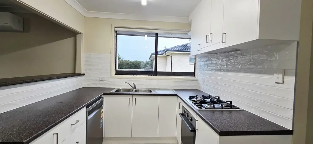 Freshly painted and renovated house in heart of Seven Hills!
