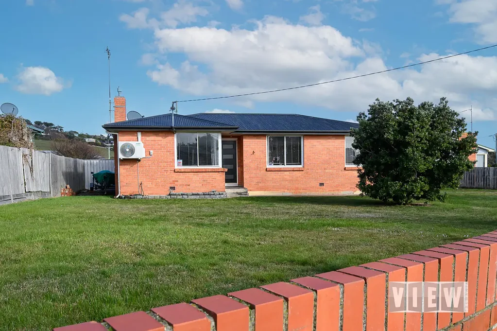 East Devonport 3 Bedroom Investor Opportunity: Solid Brick Home on Large Corner Block
