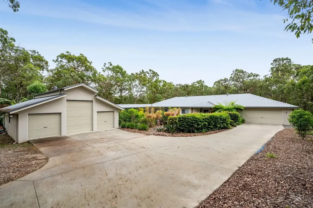 Private Acreage Retreat with Modern Family Living and Exceptional Storage