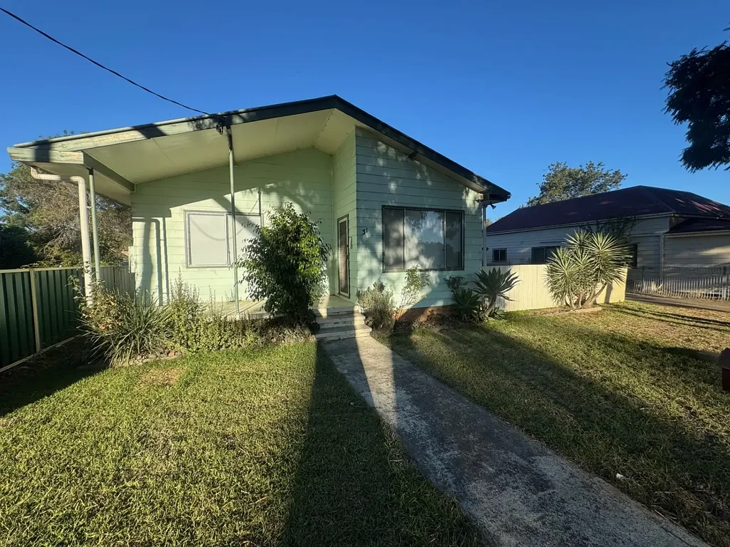 Neat Three Bedroom Home & Ample Space On Large Block!