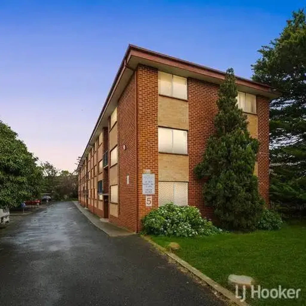 Neat Two Bedroom Top Floor Unit