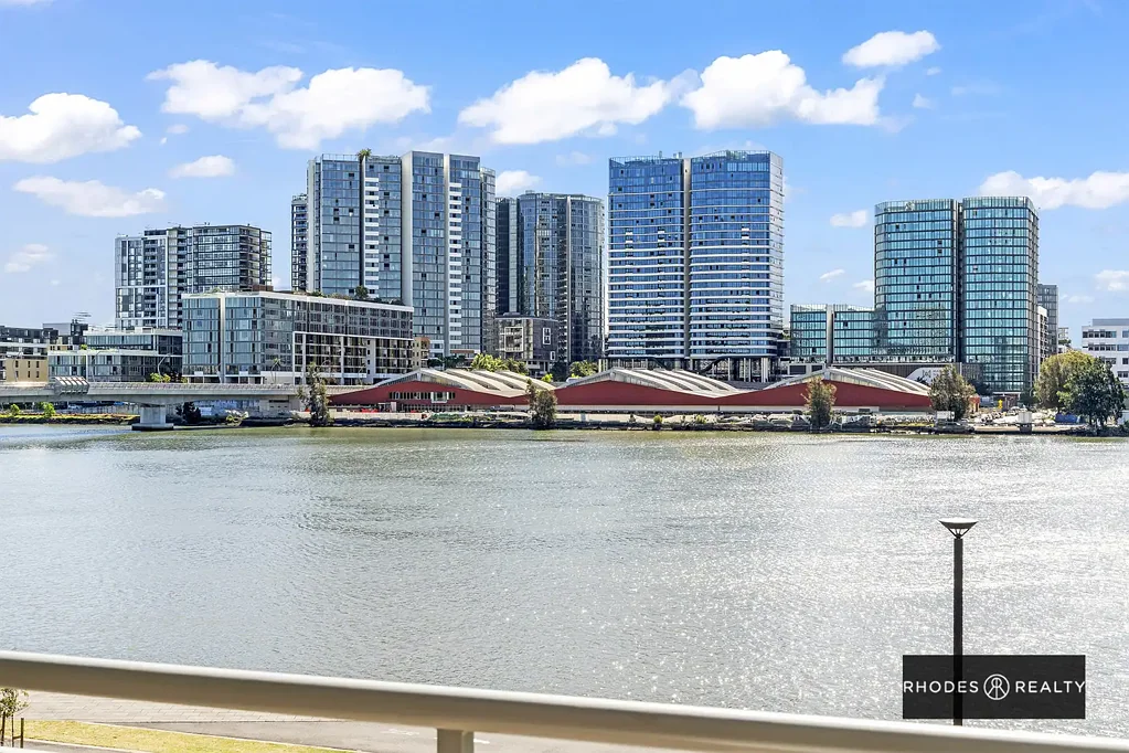 Rhodes 2ห้องนอน An Exclusive Urban Oasis with 180-Degree Waterfront Views
