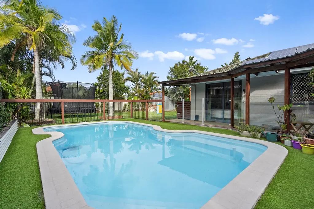 "Your New Family Pool Home Awaits" : 4 bedrooms, a backyard pool, and plenty of space for the whole family to spread out and unwind.