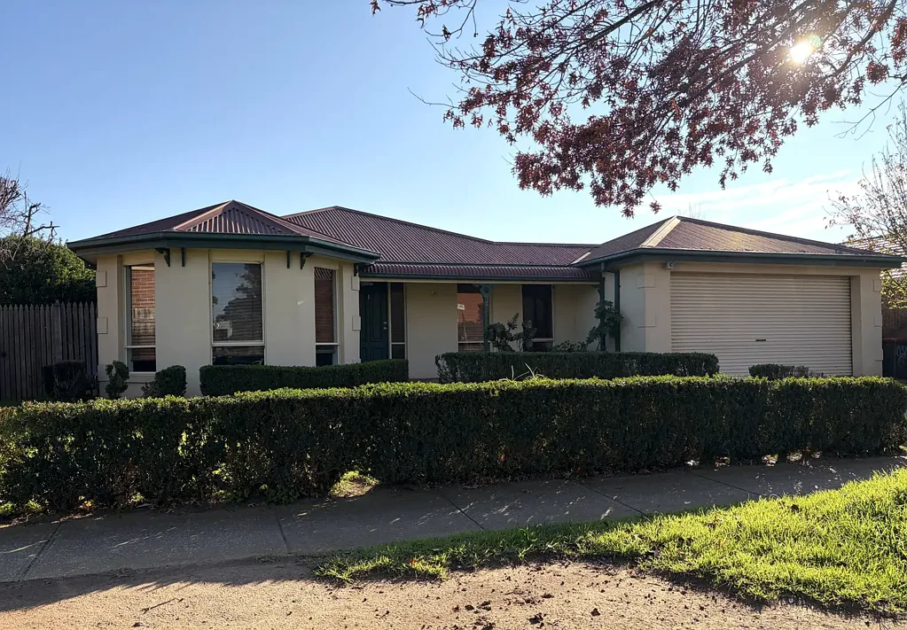 FOUR BEDROOM, TWO LIVING FAMILY HOME