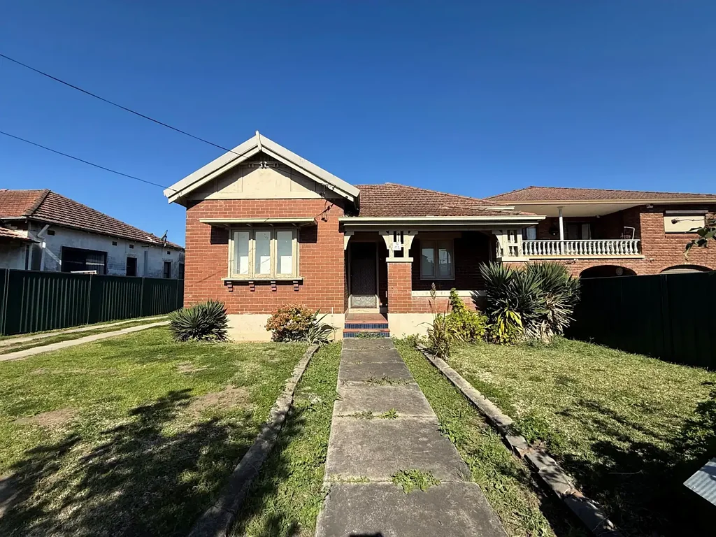 Three Bedroom House with Large Backyard