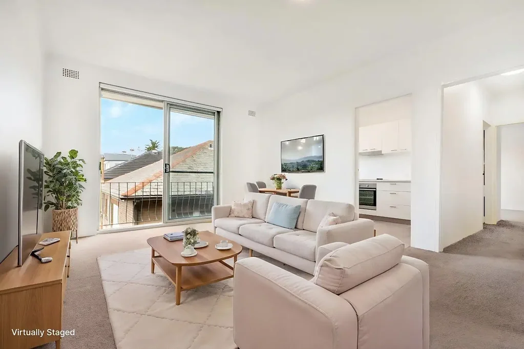 STYLISH TOP FLOOR RENOVATED APARTMENT