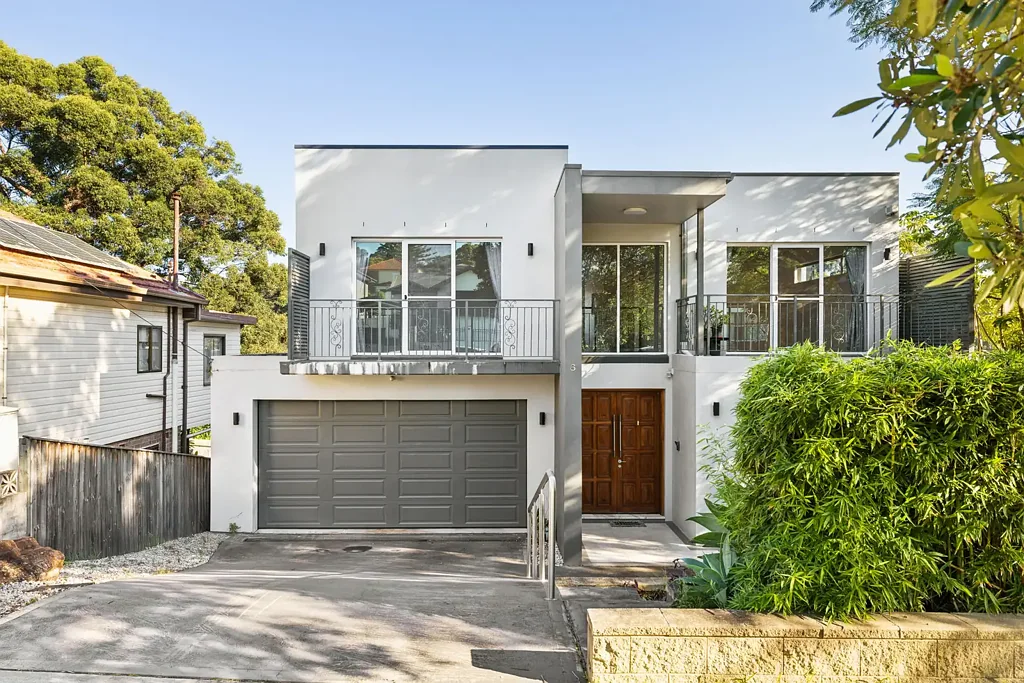 Light-filled renovated 3-story house with lock-up garage