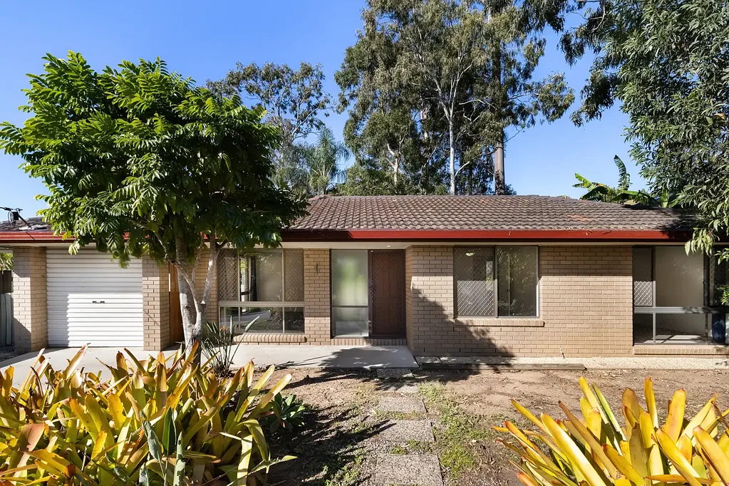 Freshly Updated Family Home Surrounded by Tropical Gardens