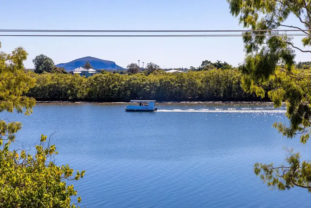 TRUE NORTH FACING WITH EXPANSIVE RIVER VIEWS!