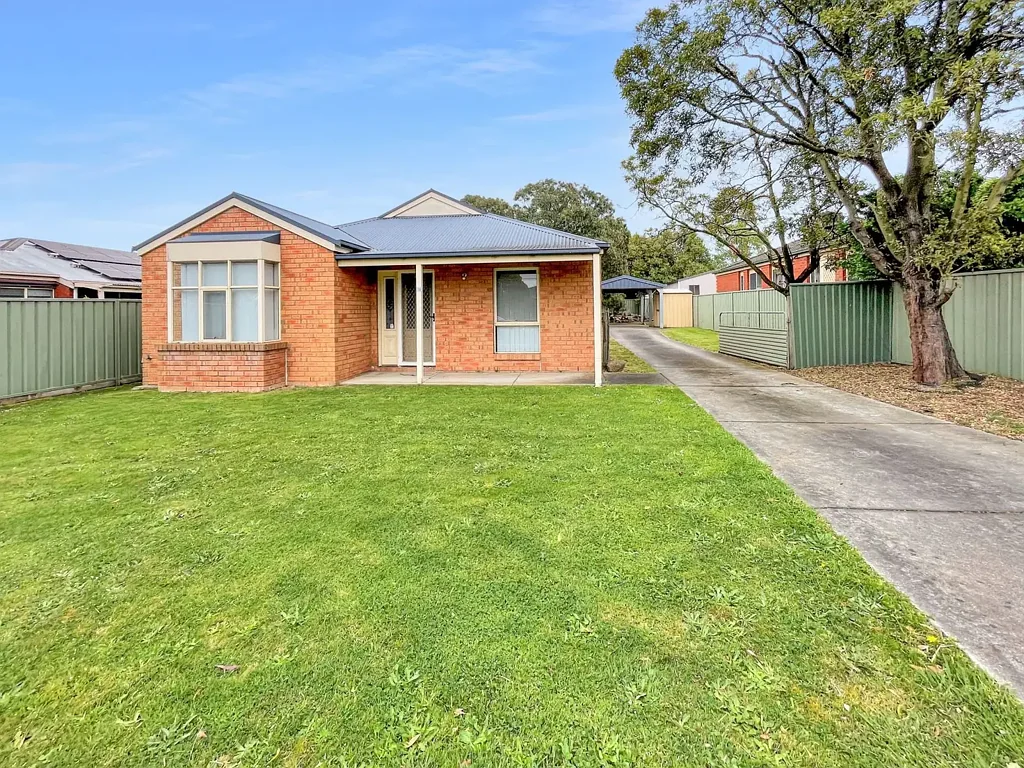 THREE BEDROOM HOME WITH SPACIOUS BACKYARD