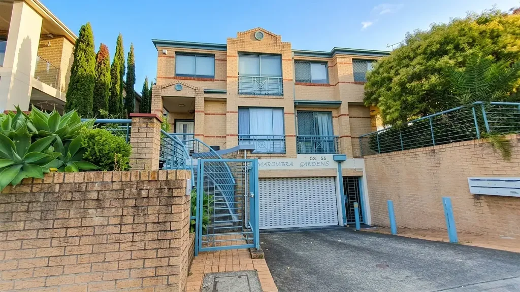 Private three-bedroom townhouse with wrap-around yard in boutique complex
