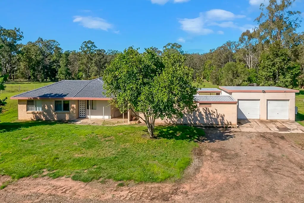 Spacious Family Acreage Living with Pool
