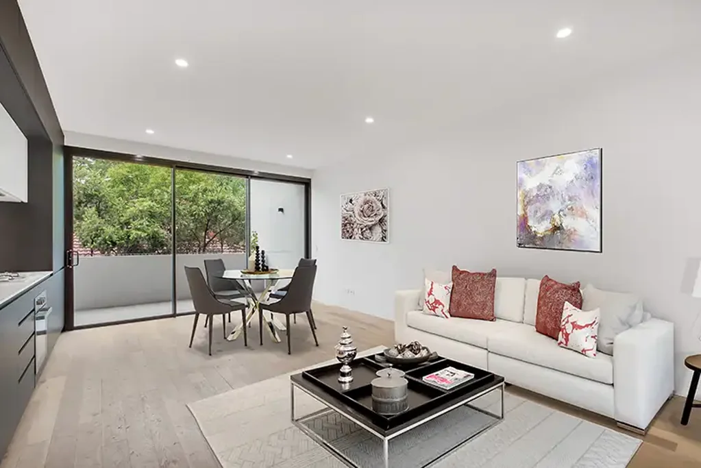 Luxury Near-New Two-Level Apartment in Prime Location
