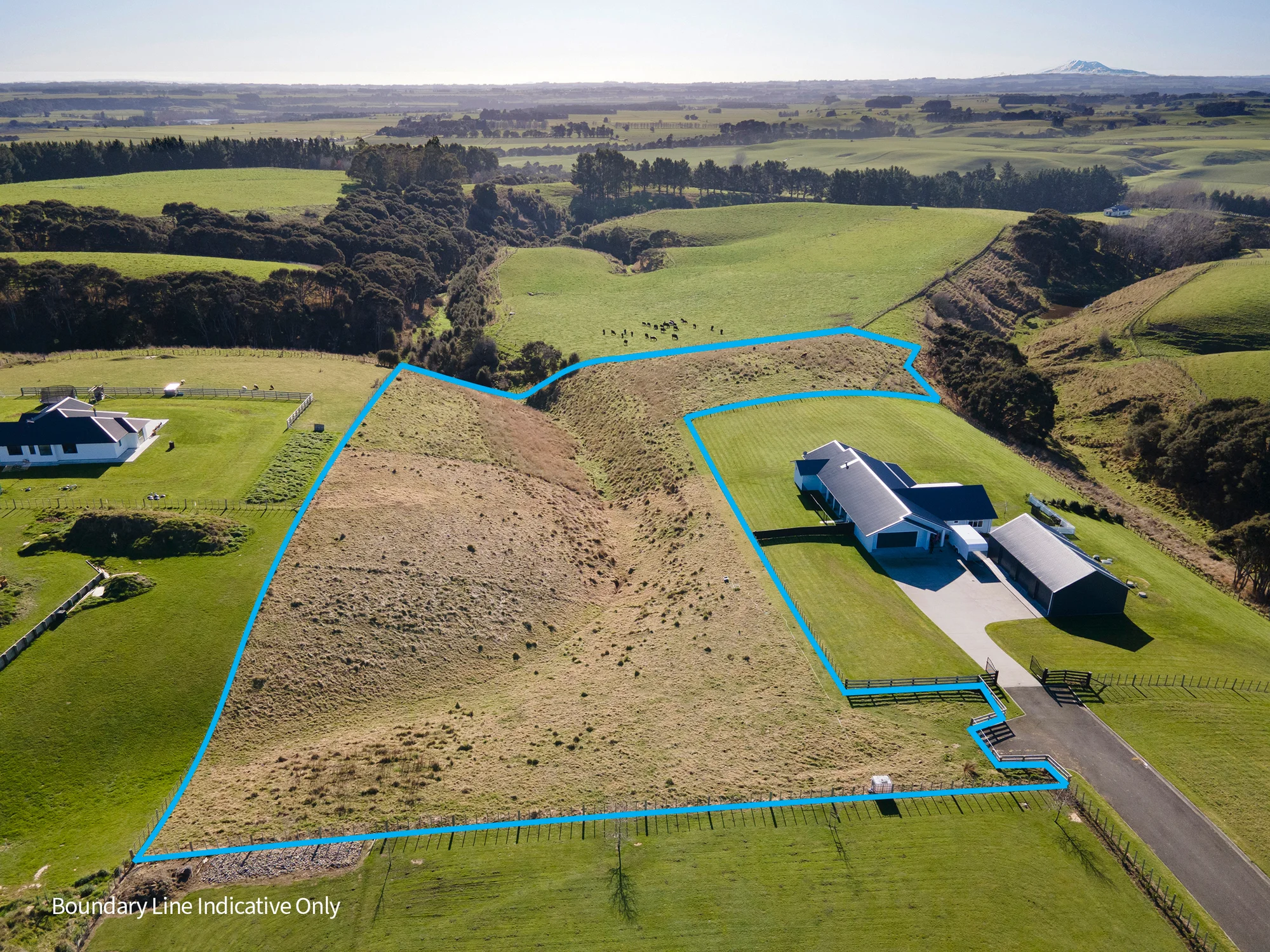 Halcombe  A Blank Canvas Framed by Mountain Views