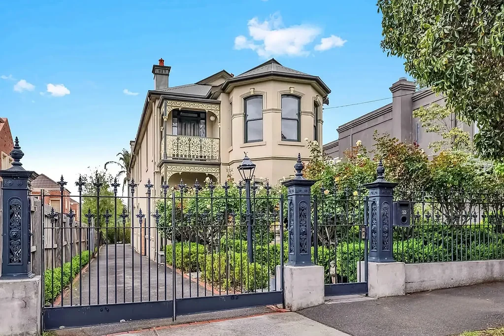 Beautifully crafted double-storey brick Victorian-inspired residence.