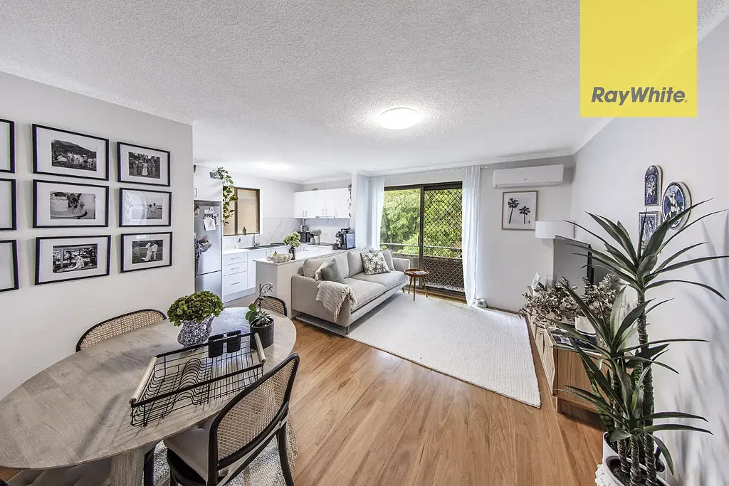 RENOVATED TOP FLOOR TWO BEDROOM UNIT IN PRIME RIVERBANK LOCATION