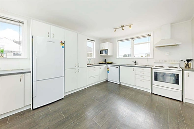 Fully Fenced 4-Bedroom Home with Garage and Carport